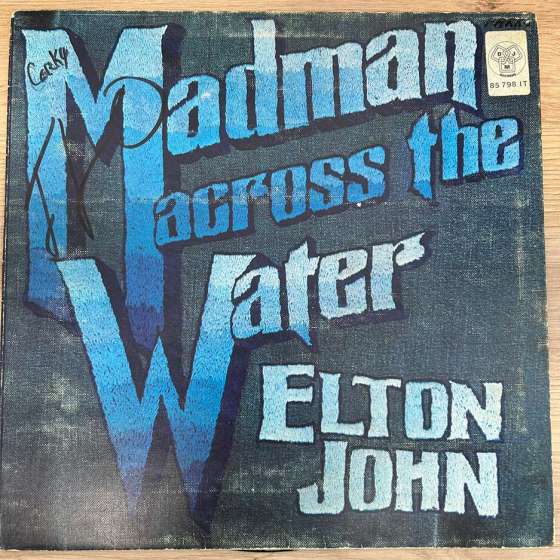 Elton John – Madman Across...